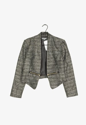 Grauer und schwarzer strukturierter Damen-Cropped-Blazer mit langen Ärmeln, offenem Vorderteil und zwei goldenen Reißverschlusstaschen, hängend an einem schwarzen Kleiderbügel.