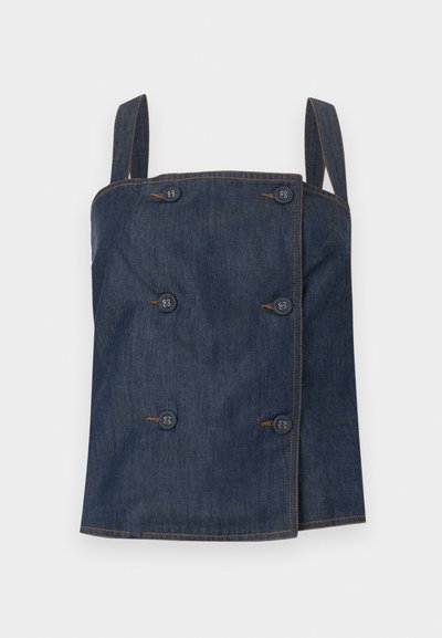 Μπλε σκούρο denim τοπ χωρίς μανίκια με διπλή σειρά κουμπιών και ορατή καφέ ραφή σε ανοιχτό φόντο.