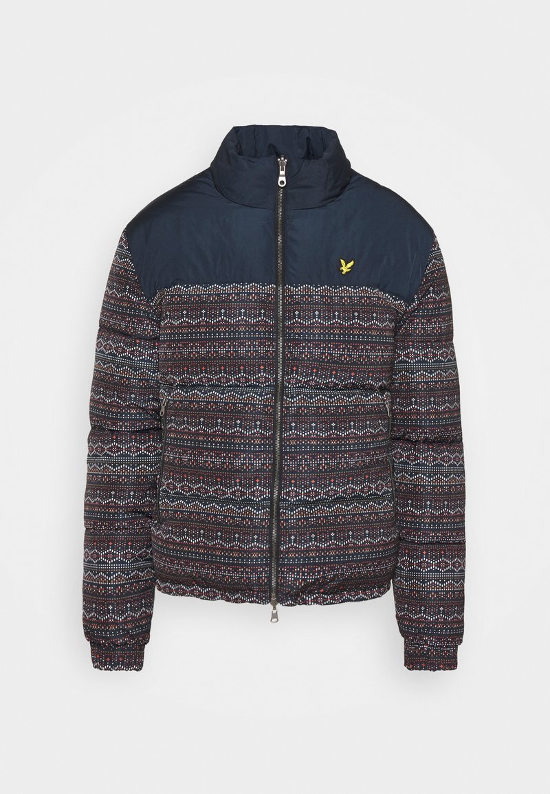 Padded jacket z granatową górną częścią i wzorzystą dolną połową w ciemnych tonach, z geometrycznymi wzorami oraz zapięciem na zamek z przodu.