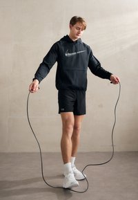 Nike Performance HOODIE - Jersey con capucha - black