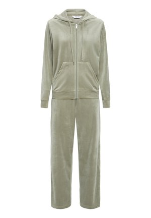 Világoszöld velúr melegítő szett cipzáras kapucnis pulóverrel, elején zsebekkel, húzózsinóros kapucnival és hozzáillő egyenes szárú nadrággal.