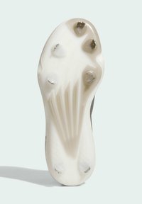 White athletic shoe sole with a textured pattern, five conical studs in varying sizes, and a sleek, streamlined design.