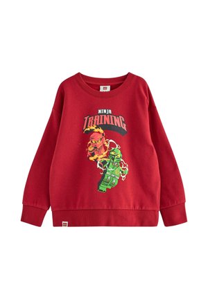 Rød sweatshirt med et grafisk tryk af to ninjaer og teksten "NINJA TRAING." Lavet af blødt stof med ribbede manchetter og halsudskæring.