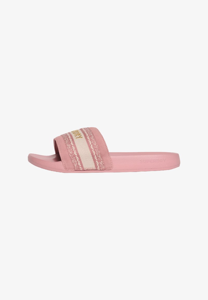 Roze slipper met een gestructureerde band met beige accenten, een gevoerde zool en een reliëflogo. Zachte stofconstructie.