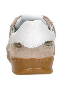 Tan suede shoe with a white leather heel, curved design, rubber sole, and zigzag stitching along the edge. Features a smooth texture.