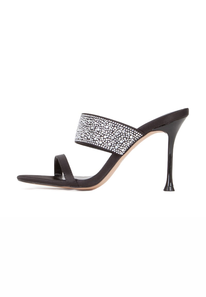 Black high-heeled sandal with a sleek design, featuring a wide sparkly strap adorned with small silver rhinestones and a narrow toe strap.