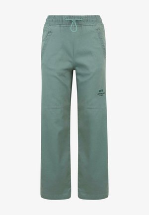 Light green wide-leg pants with an elastic waistband and drawstring. Feature side pockets and a printed logo detail on one leg.
