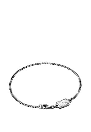 Silver chain bracelet with a textured rectangular clasp. The chain features interwoven links, providing a shiny, smooth finish.