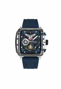 Montre carrée avec un boîtier transparent, un cadran bleu, des accents rouges et jaunes, et un bracelet en silicone bleu marine. Comprend plusieurs sous-cadrans et de grands index horaires.