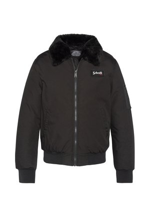 Zwarte bomberjack met nepbontkraag. Voorzien van een ritssluiting aan de voorkant, geribbelde manchetten en een zijzak met rits. Subtiel logo op de borst.