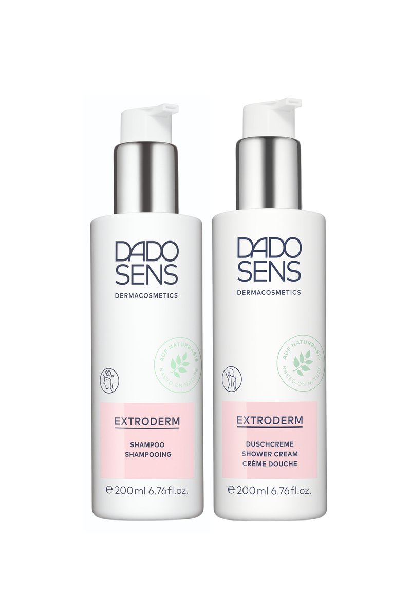 Two white bottles with pump caps, labeled "EXTRODERM" in blue text. One is shampoo, the other is shower cream, both 200 ml. Pink accents.