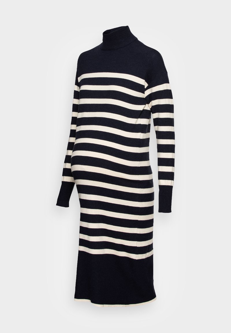 Prugasta haljina u mornarsko plavoj i slonovači, s visokim rolkragnom, dugim rukavima i prilagođenim siluetom dizajniranom za nošenje tijekom trudnoće.