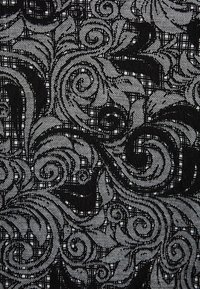 Svart textil med intrikata virvlande mönster, med en texturerad yta och kontrasterande ljusare trådar som skapar en rutliknande design.