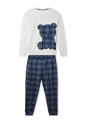 Set di pigiama in cotone composto da una maglietta bianca a maniche lunghe con una grafica di un orsetto in navy e pantaloni a quadri navy con elastico in vita.