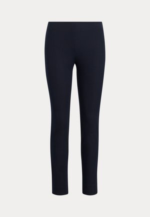 Leggings azul marinho, feitos de um tecido elástico, com design ajustado, comprimento até meio da panturrilha, textura suave e sem costuras ou embellimentos visíveis.