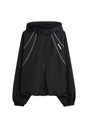 Zwarte zip-up jack met capuchon, voorzien van witte contrasterende stiknaden, elastische manchetten en een losse pasvorm. Gemaakt van lichtgewicht materiaal.