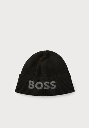 Black knit beanie with a folded cuff, featuring a gray logo "BOSS" displayed prominently on the front. Soft texture, snug fit.