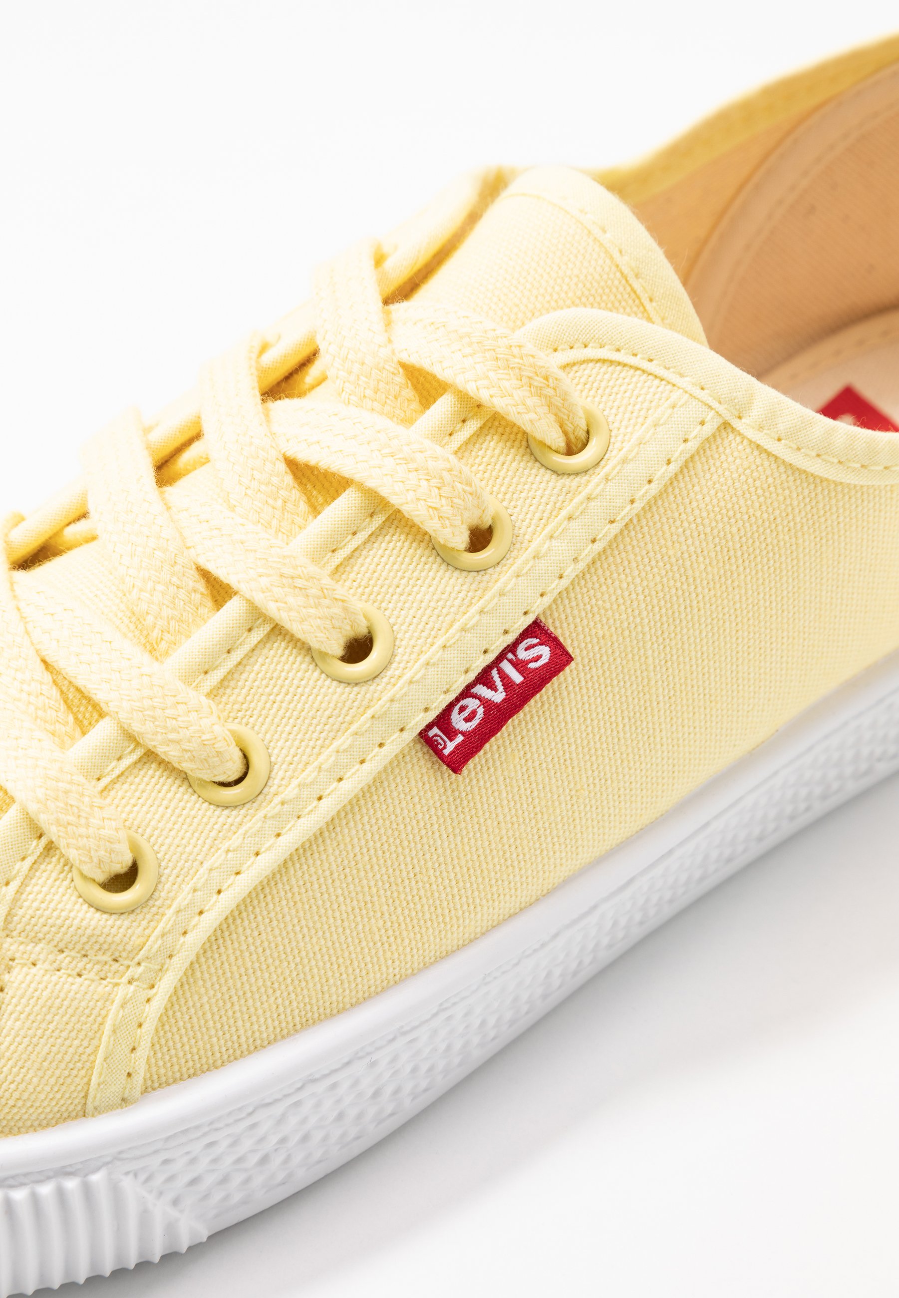 pastel yellow trainers