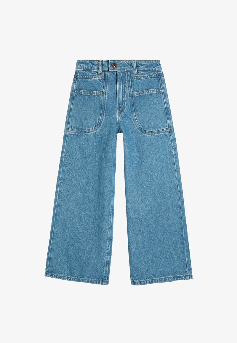 Vaaleansinisiä leveälahkeisia farkkuja, joissa on korkea vyötärö, etu- ja takataskut sekä kontrastia oranssia tikkausta saumoissa.