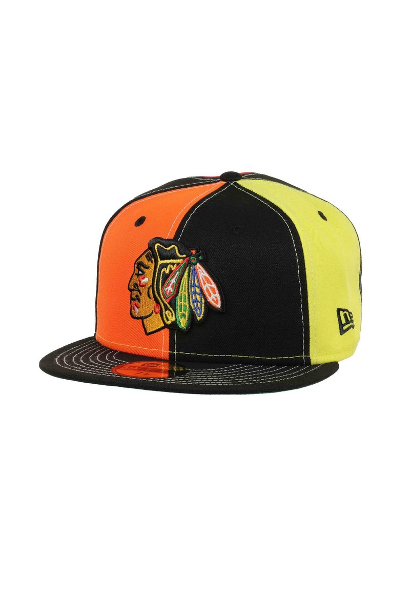 Black cap with orange and yellow panels, featuring an embroidered Native American logo on the front and a flat brim.