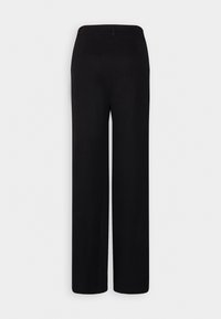 Pantalons larges noirs taille haute avec une ceinture lisse et sans poches ni embellissements visibles, présentés sur un fond blanc uni.