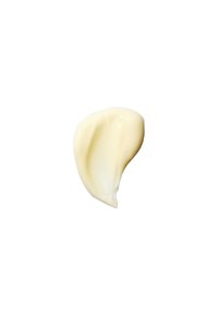 Romige lichtbeige cosmetische producten in een gladde, gedraaide vorm, met een glanzende afwerking en een zachte textuur tegen een witte achtergrond.