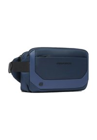 Blaue Polyester-Umhängetasche mit geschwungenem Design, Reißverschlussfächern und einer strukturierten Frontplatte. Verfügt über einen schwarzen, verstellbaren Riemen.