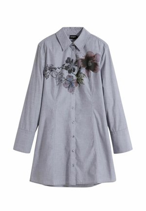 Chemise à manches longues gris clair avec col pointu, ornée d'un imprimé floral d'un côté et d'une fermeture à boutons sur le devant. Tissu lisse et tissé.