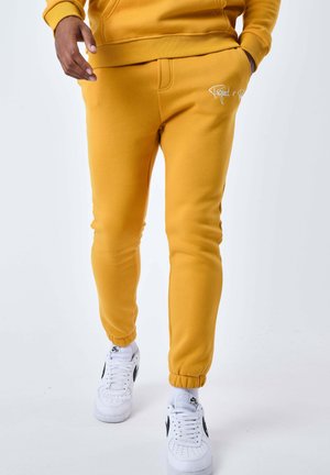 Pantaloni sportivi - jaune moutarde