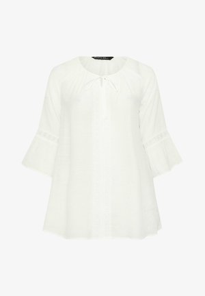 Weiße locker sitzende Bluse mit 3/4 Glockenärmeln, Spitzenbesatz an Ärmeln und Vorderseite, rundem Ausschnitt und Bindebandverschluss am vorderen Halsausschnitt.