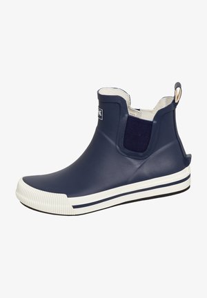 Navy rubber ankle boot with white sole, featuring elastic side panels and textured grip on the toe. Smooth finish with logo detail.