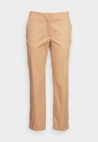 Calças beige ajustadas com uma textura suave, pernas retas e dois bolsos laterais; detalhe de costura minimalista ao longo da cintura.