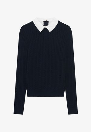 Navy knitted sweater with a white collared neckline, featuring a textured pattern and ribbed cuffs and hem.