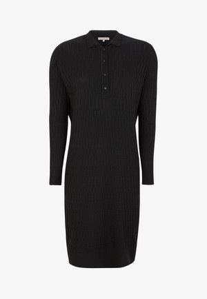 Robe noire en maille avec col polo, manches longues, boutonnage sur le devant, motif texturé et silhouette droite, conçue pour une coupe ajustée.