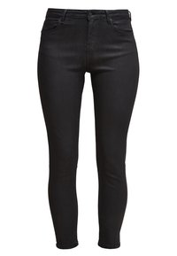Jean skinny noir en denim, avec une taille haute, cinq poches, et une texture lisse. Le tissu présente une décoloration minimale.
