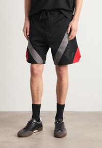 HUGO Verryttelyhousut - black