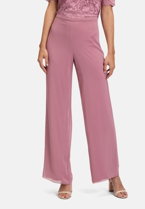 Wide-leg, light pink trousers made from a flowy fabric, featuring a smooth texture and a high waistband.