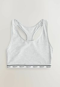 Bustieră sport din bumbac gri, cu design racerback. Are o bandă de talie albă contrastantă cu inscripția "NEXT" imprimată în negru. Textură netedă.