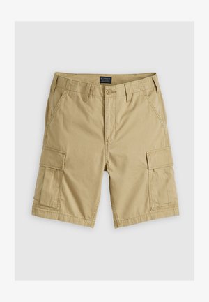 Bežid cargopüksid, mis on valmistatud vastupidavast puuvillast. Omadusteks on kyljetaskud, eesmine nööbisuletus ja tugevdusõmblused.