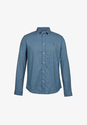 Modrá košile s dlouhým rukávem na knoflíky vyrobená z lehké strukturované tkaniny, s malým vyšitým logem na hrudi a klasickým límcem.