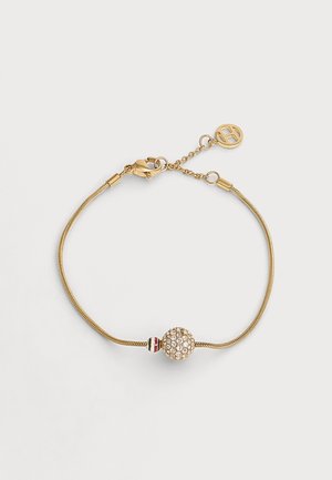 Bracelet délicat en chaîne d'or avec une perle ronde en cristal étincelante et une perle plus petite rayée, avec un fermoir mousqueton et une chaîne ajustable.