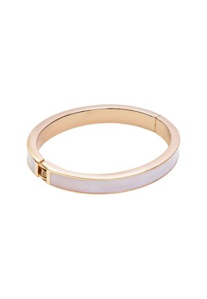 Gold-tone bangle bracelet featuring a white enamel inlay, smooth surface, and a hinged clasp for secure closure.