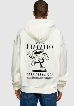 White hoodie with a large black graphic featuring a cartoon coffee cup character and the text "More Espresso Less Depresso."