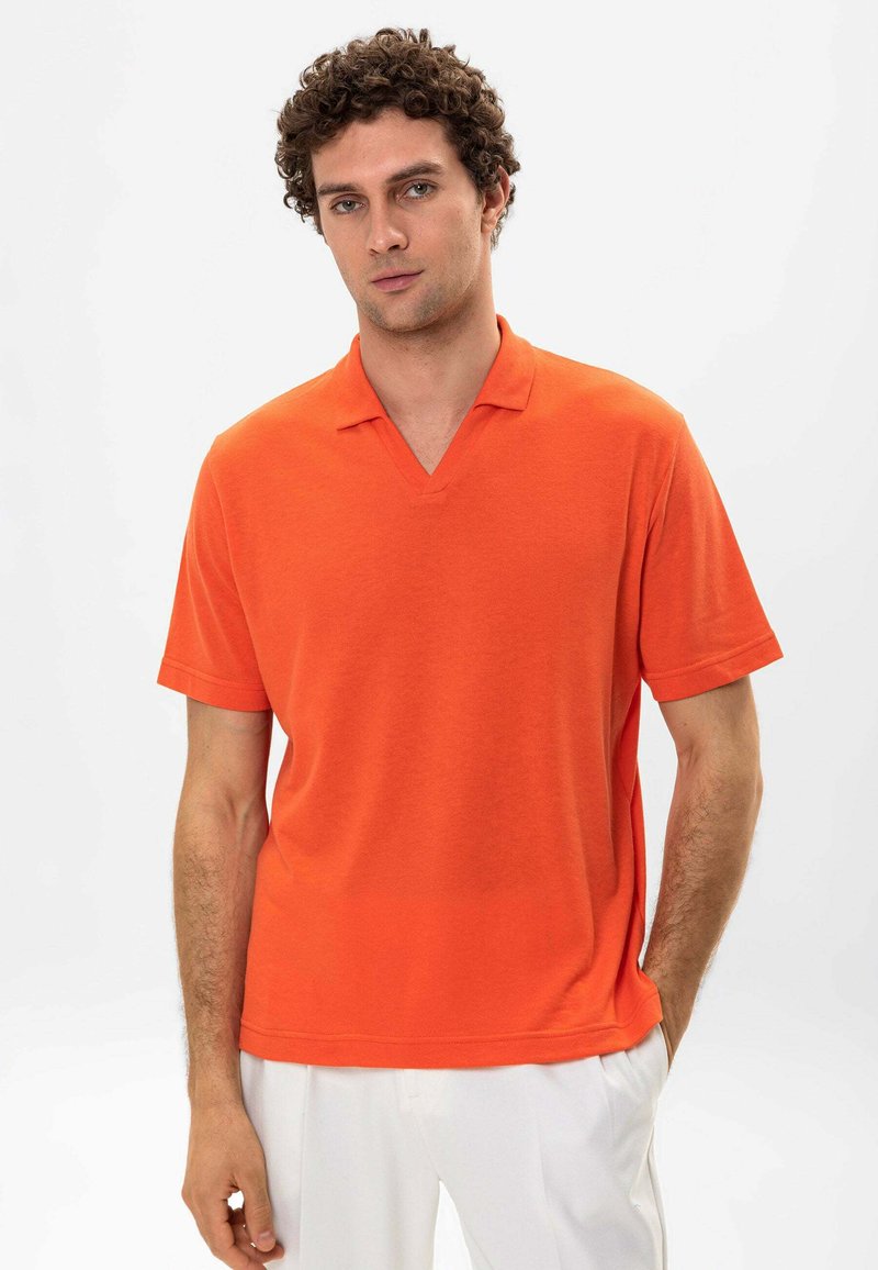 Antioch Polo salmon/rosa salmone Zalando.it