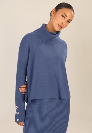 - Sweter