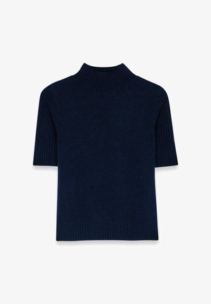 Mörkblå kortärmad polotröja med ribbad typ och fåll. Mjukt tyg med en strukturerad, figursydd design.