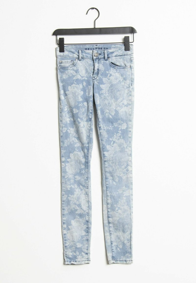 Light blue skinny jeans featuring a floral print pattern, made of denim. They have a classic five-pocket design and a standard zip fly.