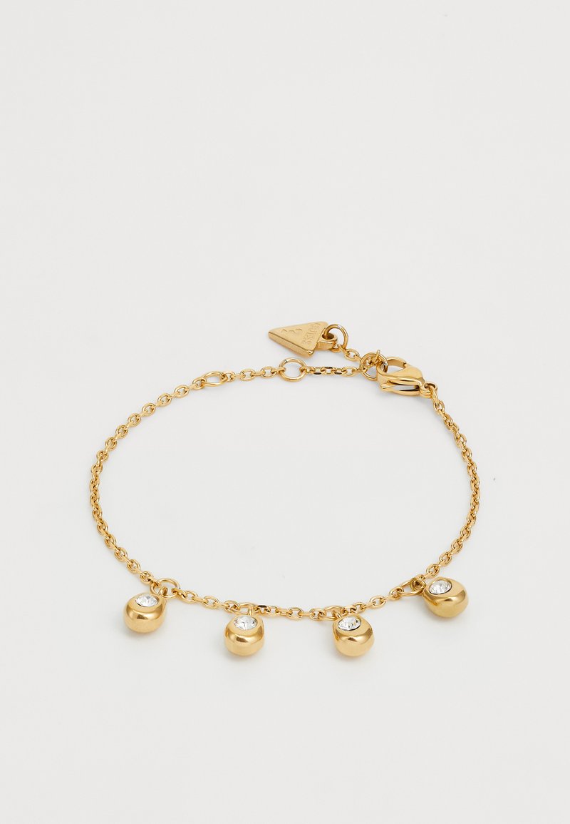 Bracciale in oro caratterizzato da un delicato design a catena con tre accenti arrotondati, ciascuno incastonato con un cristallo trasparente, e una sicura chiusura a gancio.