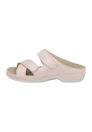 Pink sandal with textured upper, two hook-and-loop straps, open toe design, and a white rubber sole. Contoured for comfort.