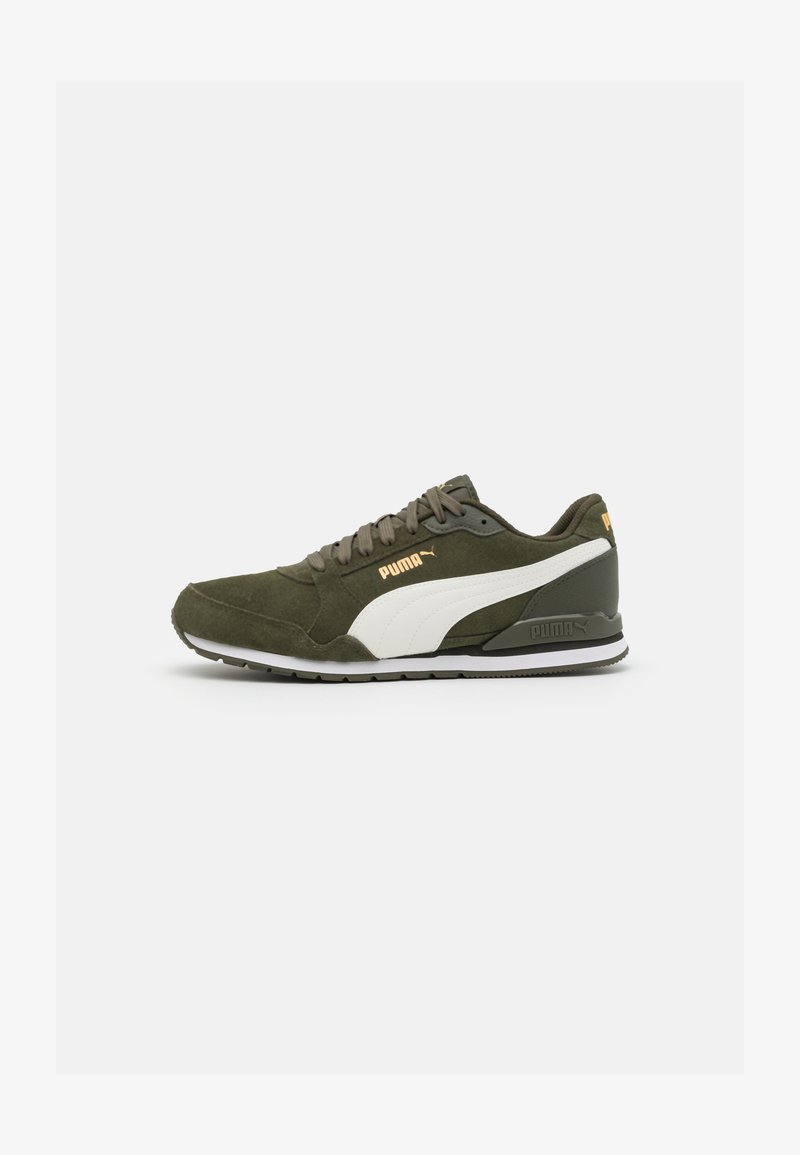 Olive green suede sneaker with white leather accents, round toe, flat rubber sole, and gold logo detailing on the side and tongue.